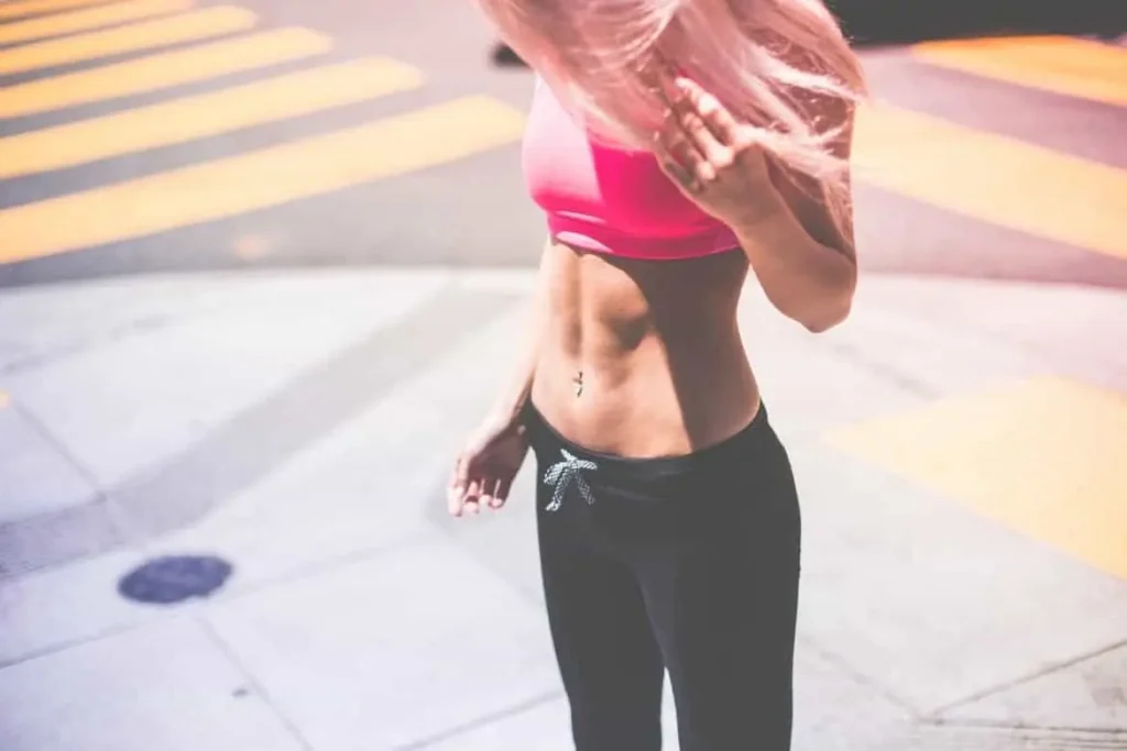 Woman with toned stomach after LA-EMS Body Sculpting Treatment Upton Park